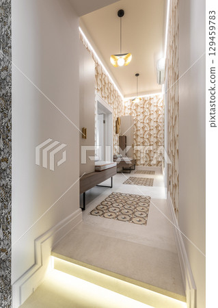 Stylish Hallway with Leaf Patterned Wallpaper and Benches Stylish Hallway with Leaf Patterned Wallpaper and Benches 129459783