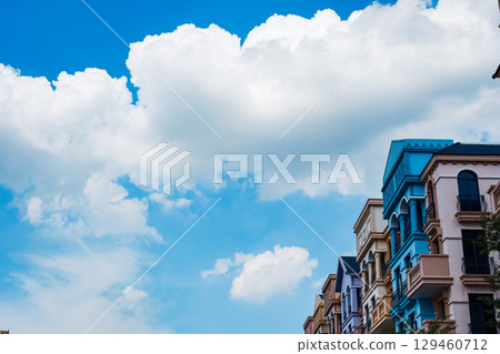 Pastel-Colored Buildings with Wide Sky View 129460712