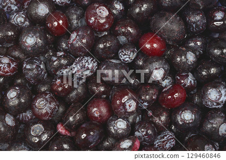Freshly thawed blueberries 129460846