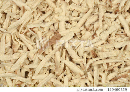 Finely grated smoked tofu Finely grated smoked tofu 129460859