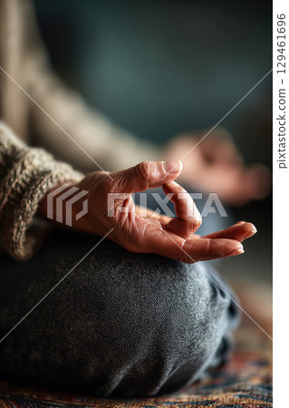 Hands in meditation pose outdoors, close up 129461696
