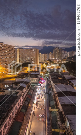 Aug 7 2025 twilight of Traditional wet market in Ngau Chi Wan Hong Kong 129462768