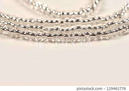 Strands of smal silver-lined seed beads Strands of smal silver-lined seed beads 129462776