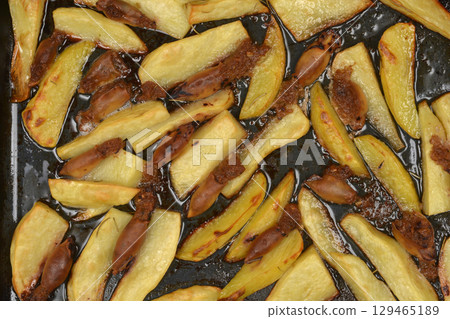 Potato wedges and small stuffed squid Potato wedges and small stuffed squid 129465189