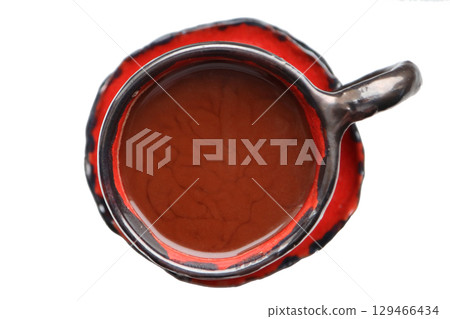 Red and black ceramic coffee cup. Red and black ceramic coffee cup. 129466434