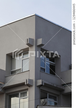 Modern geometric Building against blue Sky. Modern geometric Building against blue Sky. 129466445