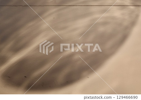 The shadow of the glass shade on the wall The shadow of the glass shade on the wall 129466690