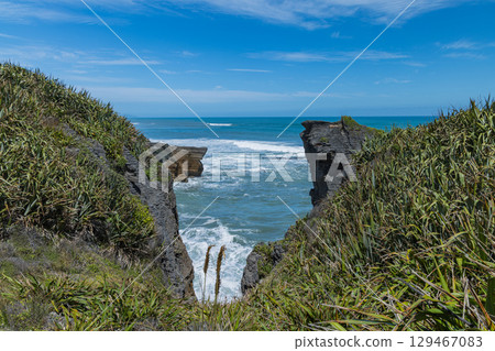 Pancake Rocks in Punakaiki on the West Coast of New Zealand Pancake Rocks in Punakaiki on the West Coast of New Zealand 129467083
