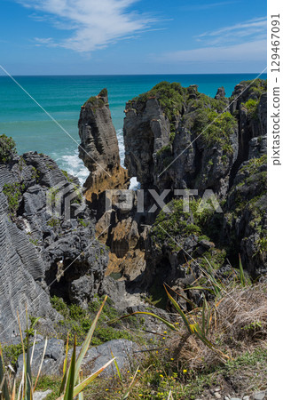 Pancake Rocks in Punakaiki on the West Coast of New Zealand Pancake Rocks in Punakaiki on the West Coast of New Zealand 129467091