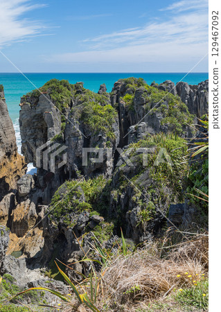 Pancake Rocks in Punakaiki on the West Coast of New Zealand Pancake Rocks in Punakaiki on the West Coast of New Zealand 129467092