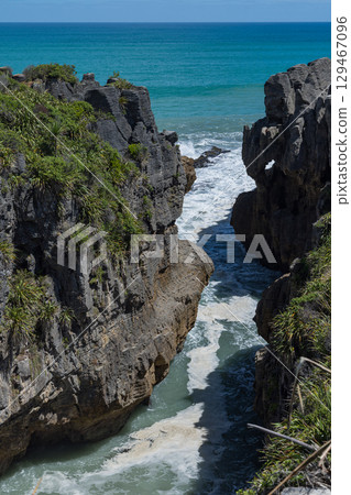 Pancake Rocks in Punakaiki on the West Coast of New Zealand Pancake Rocks in Punakaiki on the West Coast of New Zealand 129467096