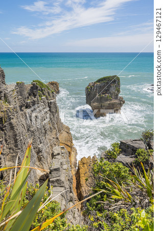 Pancake Rocks in Punakaiki on the West Coast of New Zealand Pancake Rocks in Punakaiki on the West Coast of New Zealand 129467121