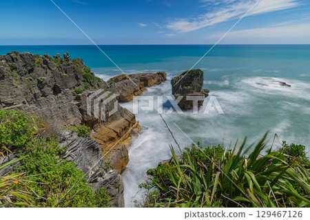 Pancake Rocks in Punakaiki on the West Coast of New Zealand Pancake Rocks in Punakaiki on the West Coast of New Zealand 129467126
