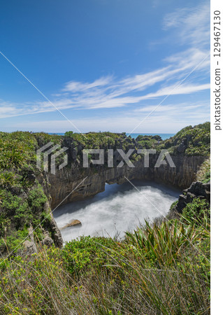 Pancake Rocks surge pools in Punakaiki on New Zealand's West Coast Pancake Rocks surge pools in Punakaiki on New Zealand's West Coast 129467130