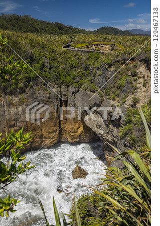 Pancake Rocks surge pools in Punakaiki on New Zealand's West Coast Pancake Rocks surge pools in Punakaiki on New Zealand's West Coast 129467138