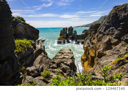 Pancake Rocks in Punakaiki on the West Coast of New Zealand Pancake Rocks in Punakaiki on the West Coast of New Zealand 129467140