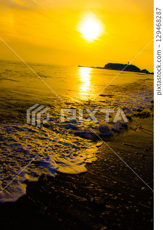 Kamakura coast illuminated by the sunset Kamakura coast illuminated by the sunset 129468287