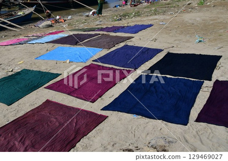 Myanmar, Mandalay, Ayeyarwady River, laundry drying, traditional clothing, longyi 129469027