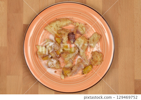Potato dumplings filled with peaches Potato dumplings filled with peaches 129469752