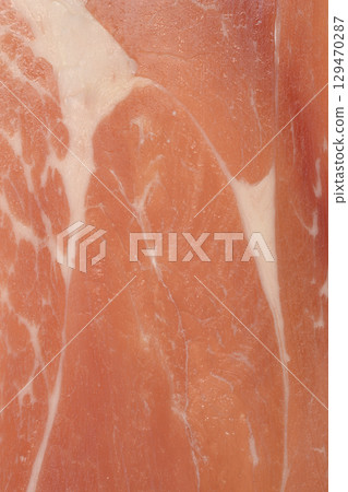 Thinly sliced piece of prosciutto Thinly sliced piece of prosciutto 129470287