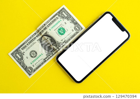 Mockup, smartphone and dollar on yellow background. Mockup, smartphone and dollar on yellow background. 129470394