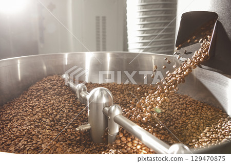Roasting Coffee Beans in Modern Facility Process Roasting Coffee Beans in Modern Facility Process 129470875