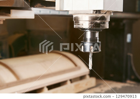 Cutting wood using a machine with numerical control. Cnc tool. Cutting wood using a machine with numerical control. Cnc tool. 129470913