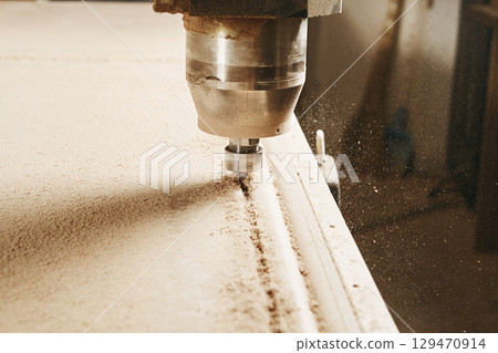CNC router machine creates a layout of the shelf complex. CNC router machine creates a layout of the shelf complex. 129470914