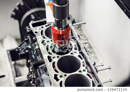 Diamond honing of engine on CNC machine. Cylinder boring engine machine. Diamond honing of engine on CNC machine. Cylinder boring engine machine. 129471134