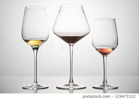 Red, white, pink wines assortment in glassware. Red, white, pink wines assortment in glassware. 129471522