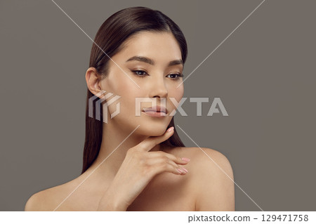 Pretty lady is satisfied with result of beauty salon services. Pretty lady is satisfied with result of beauty salon services. 129471758