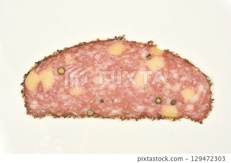 Salami with cheese and peppercorns 129472303