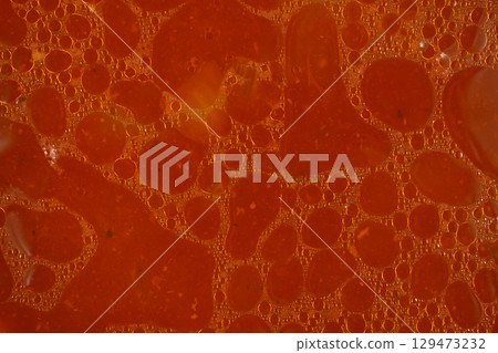 Surface of a tomato soup 129473232