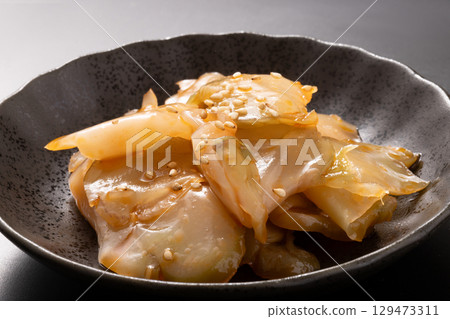 Pickled mustard greens in soy sauce 129473311