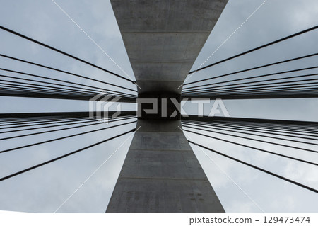The structural beauty of the bridge piers. Looking up at the Gongjiaoren Bridge, you can see the abstract and powerful architectural design. The structural beauty of the bridge piers. Looking up at the Gongjiaoren Bridge, you can see the abstract and powerful architectural design. 129473474