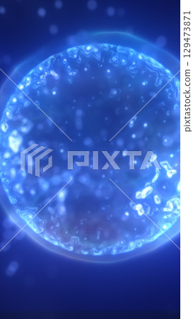 Bright glowing blue sphere surrounded by tiny floating particles, resembling a digital energy core or cell 129473871