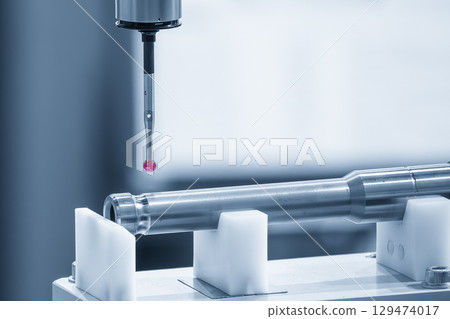 The CMM machine measuring the automotive parts in the blue tone. 129474017