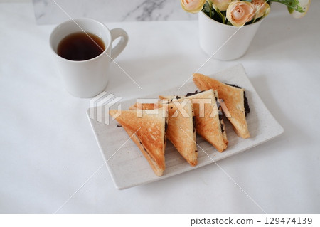 Toasted Chocolate Sandwich with Hot Tea 129474139