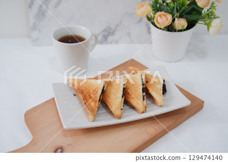 Toasted Chocolate Sandwich with Hot Tea 129474140