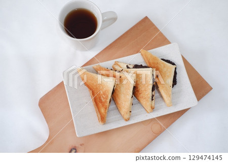 Toasted Chocolate Sandwich with Hot Tea 129474145