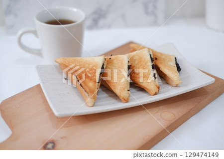 Toasted Chocolate Sandwich with Hot Tea 129474149