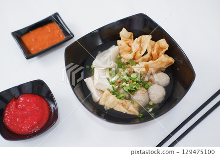 Bakso Noodle Soup with Wontons and Chili Sauce Bakso Noodle Soup with Wontons and Chili Sauce 129475100