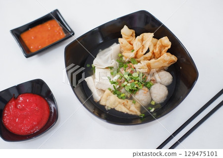 Bakso Noodle Soup with Wontons and Chili Sauce Bakso Noodle Soup with Wontons and Chili Sauce 129475101