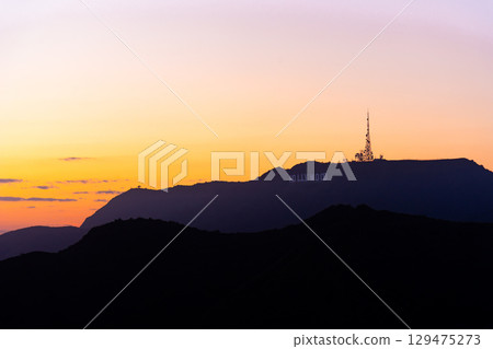 Downtown Los Angeles and Hollywood cityscape, sunset, and night view from the Griffith Observatory, USA 129475273