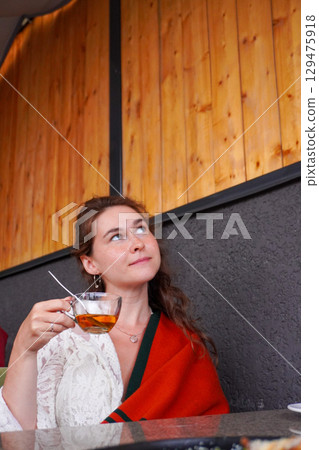 Contemplative Tea Moment Contemplative Tea Moment 129475918