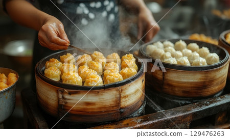 Freshly Steamed Dumplings All Ready to Serve in a Traditional Bamboo Basket, Perfect for Any Occasion 129476263