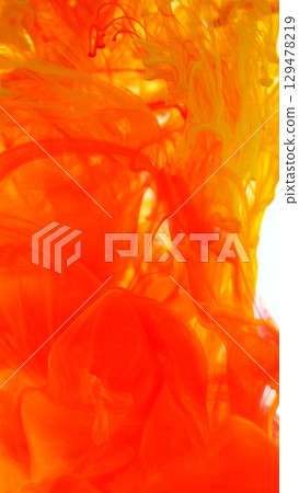 Colored Ink Abstract Shape Under the Water. Isolated on White Background. Vertical Aspect Ratio. 129478219