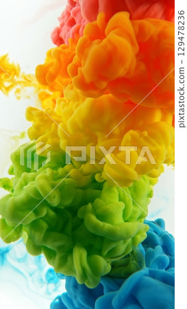 Colored Ink Abstract Shape Under the Water. Isolated on White Background. Vertical Aspect Ratio. Colored Ink Abstract Shape Under the Water. Isolated on White Background. Vertical Aspect Ratio. 129478236