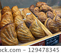 Apple pies lined up in a store 129478345