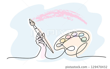Artists hand holds brush and palette with paints nearby. Concept of artists creativity. 129478432